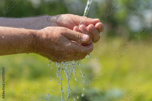 Hand washing in running water.