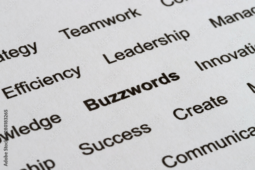 Obraz premium Business Management Buzzwords in Printed Paper