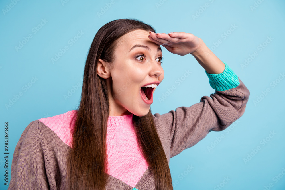 Side profile close-up photo of funky pretty lady holding palm near forehead holding mouth opened isolated bright blue background Side profile close-up photo of funky pretty lady holding palm near forehead holding mouth opened isolated bright blue background