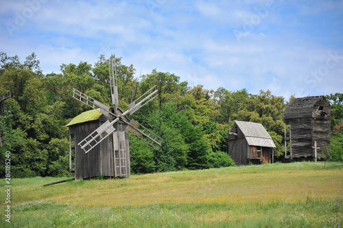 Windmills. Ukraine. Ukrainian traditions. Pirogovo. Open-air museum. Blue sky. Summer. Good mood