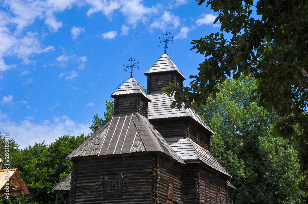 Ukrainian Compound. Ukrainian hut. Ukraine. Ukrainian traditions. Pirogovo. Open-air museum. Blue sky. Summer. Good mood