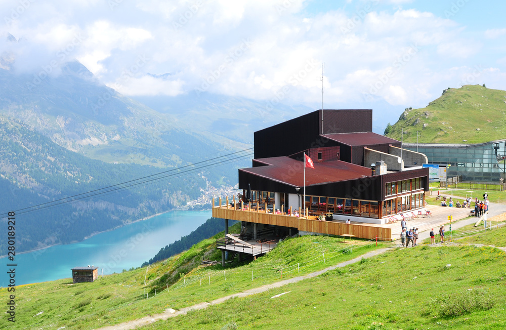 Swiss Alps: The cable car stationb Furtschella above glacier lake Silvaplana
