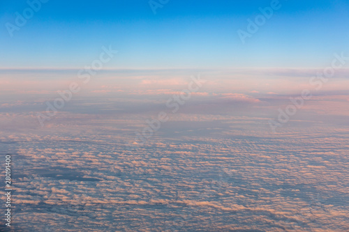 Morning white clouds under the plane