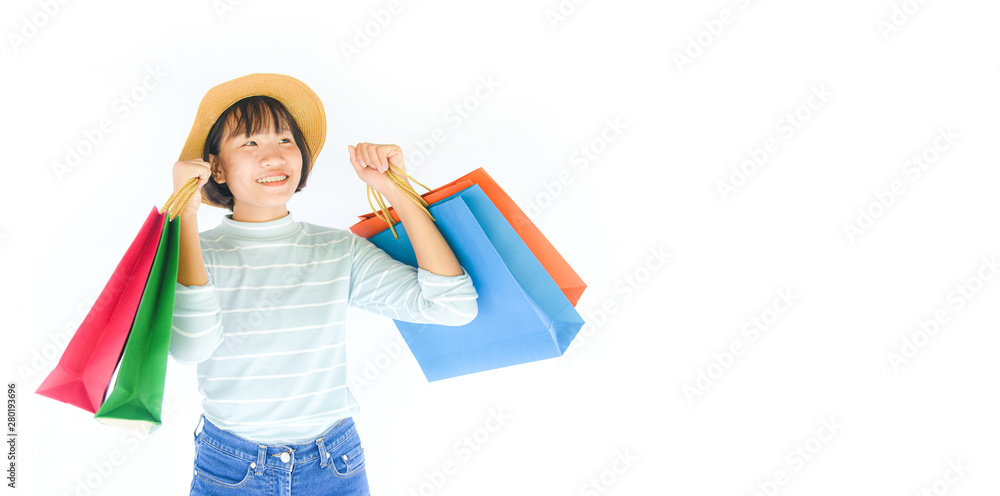 Pretty child girl hands holding shopping bag isolated on white background - Asian young woman happy summer shopping and enjoys holiday Pretty child girl hands holding shopping bag isolated on white background - Asian young woman happy summer shopping and enjoys holiday