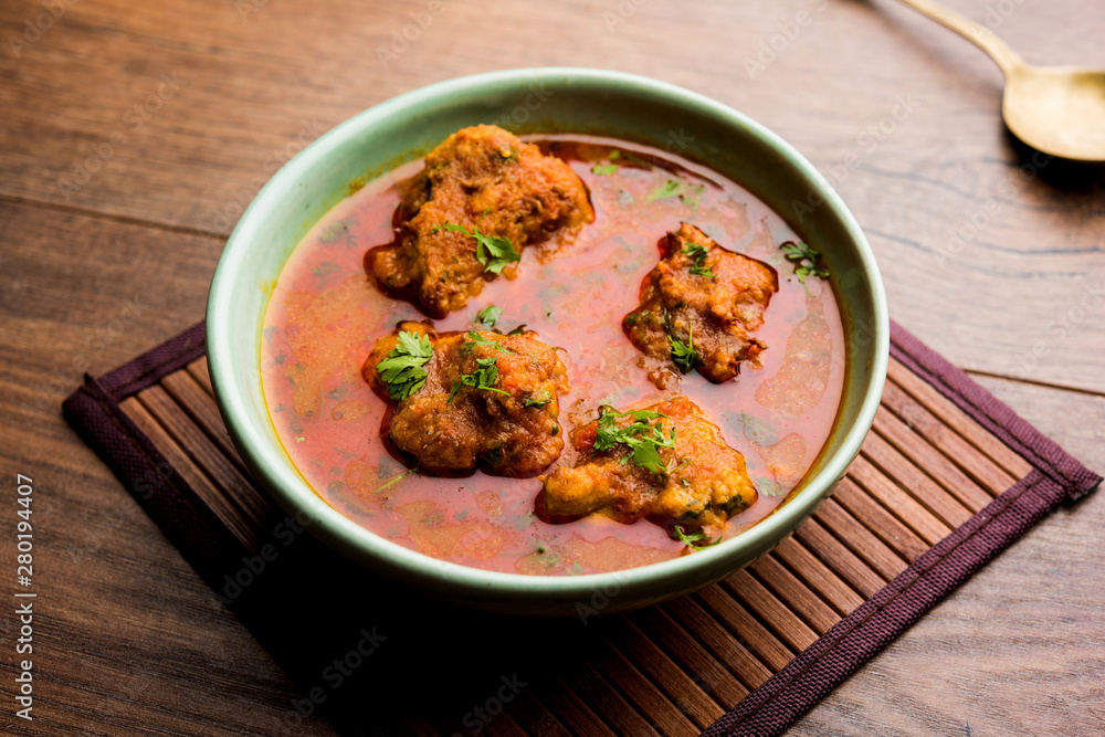 Lauki Kofta Curry made using Bottel Gourd or Doodhi, served in a bowl or karahi. selective focus Lauki Kofta Curry made using Bottel Gourd or Doodhi, served in a bowl or karahi. selective focus