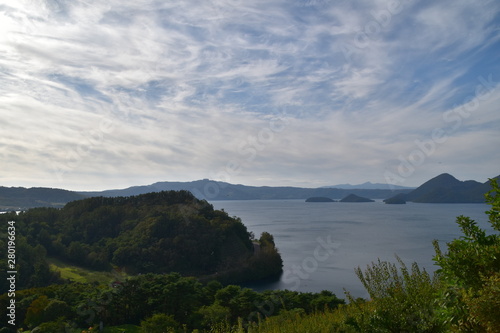 Landscape with Lake Toya and mountain in Toya, Hokkaido, Japan photo