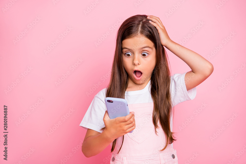 Photo of little lady free time hands hold telephone reader bad news watch date holidays over wear overall isolated pink background