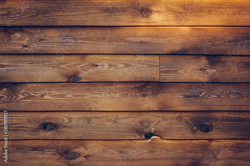 Wood plank background. Rustic closeup of wooden grunge texture. Dark wooden table. Brown surface in vintage style. Wooden table surface. Natural pattern. Shabby wall.