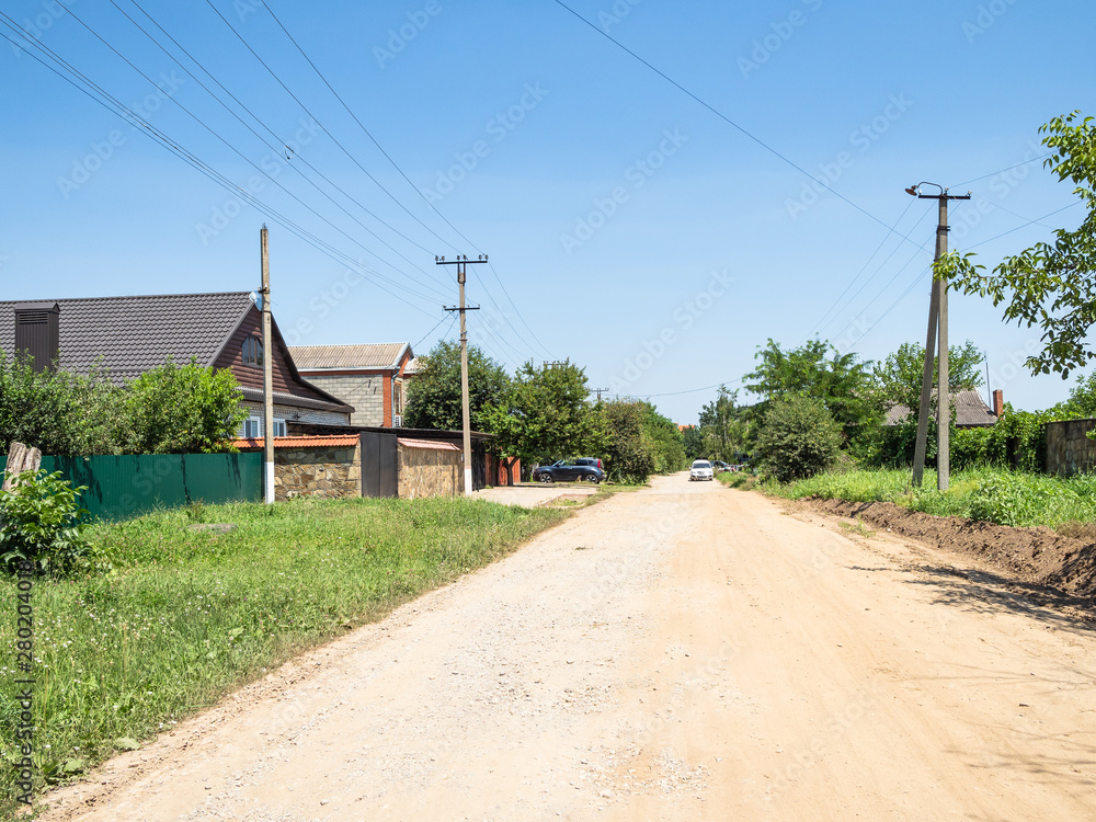 road on Centralnaya street in Akhtyrka village
