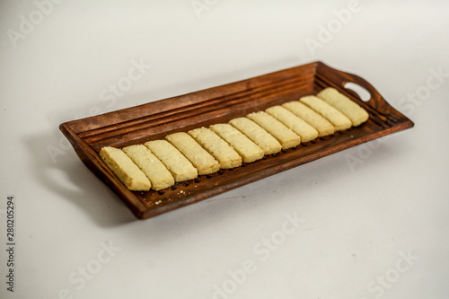 cup of tea and cookies on wooden table