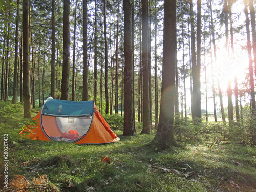 Two seconds camping tent in wold forest background fine art in high quality prints products