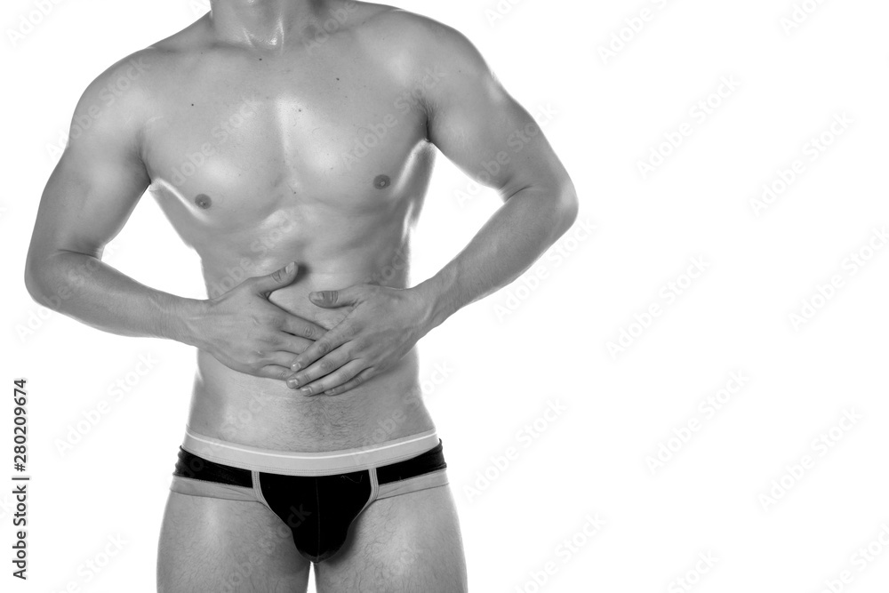 Fototapeta premium Health problem. Stomach ache. White background.