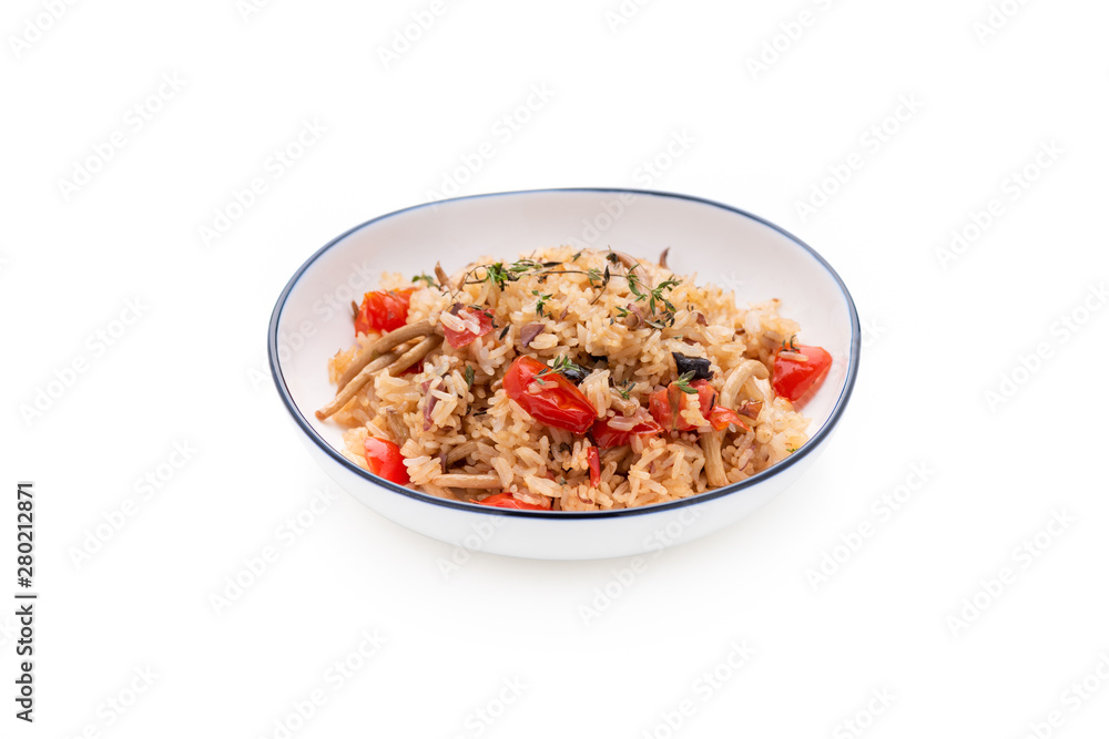 Space fried rice with tomato and mushroom on isolated white background Space fried rice with tomato and mushroom on isolated white background