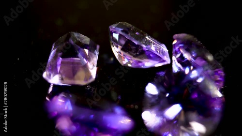 Macro. Purple amethyst. The shining edges of transparent violet amethys photo