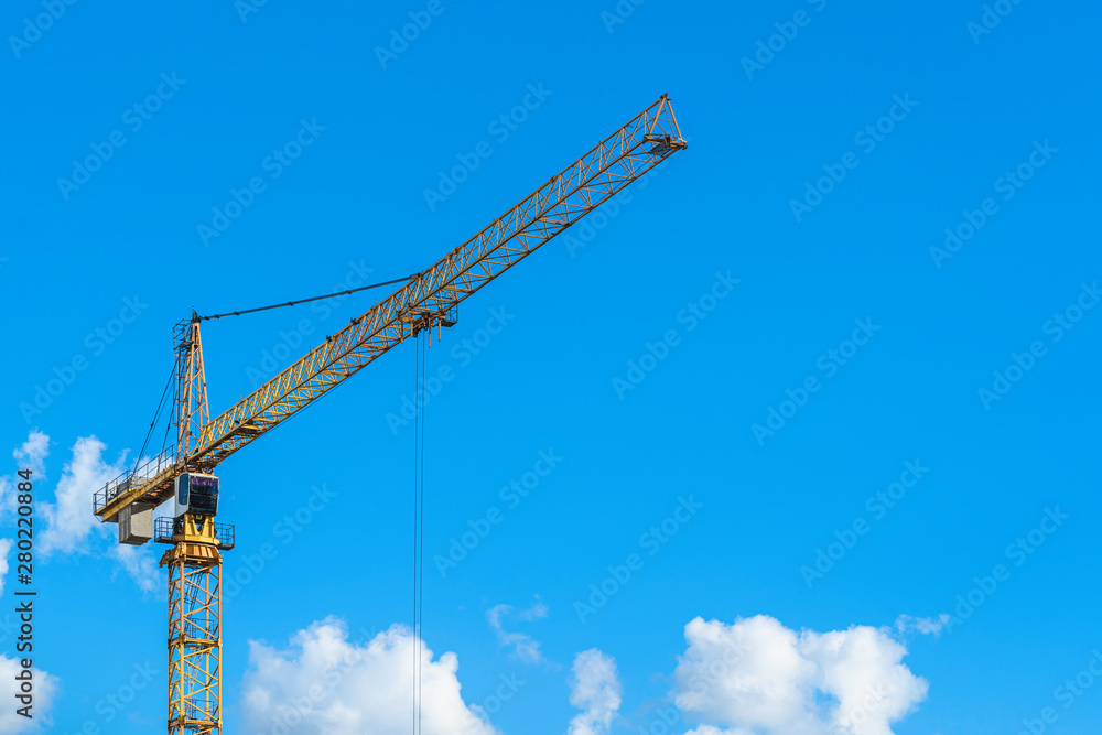 Big yellow crane with blue sky Big yellow crane with blue sky