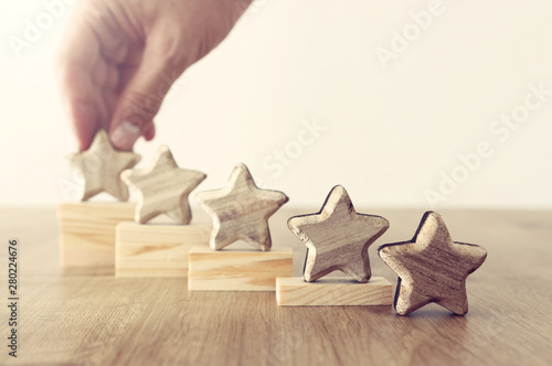 business concept image of setting a five star goal. increase rating or ranking, evaluation and classification idea photo