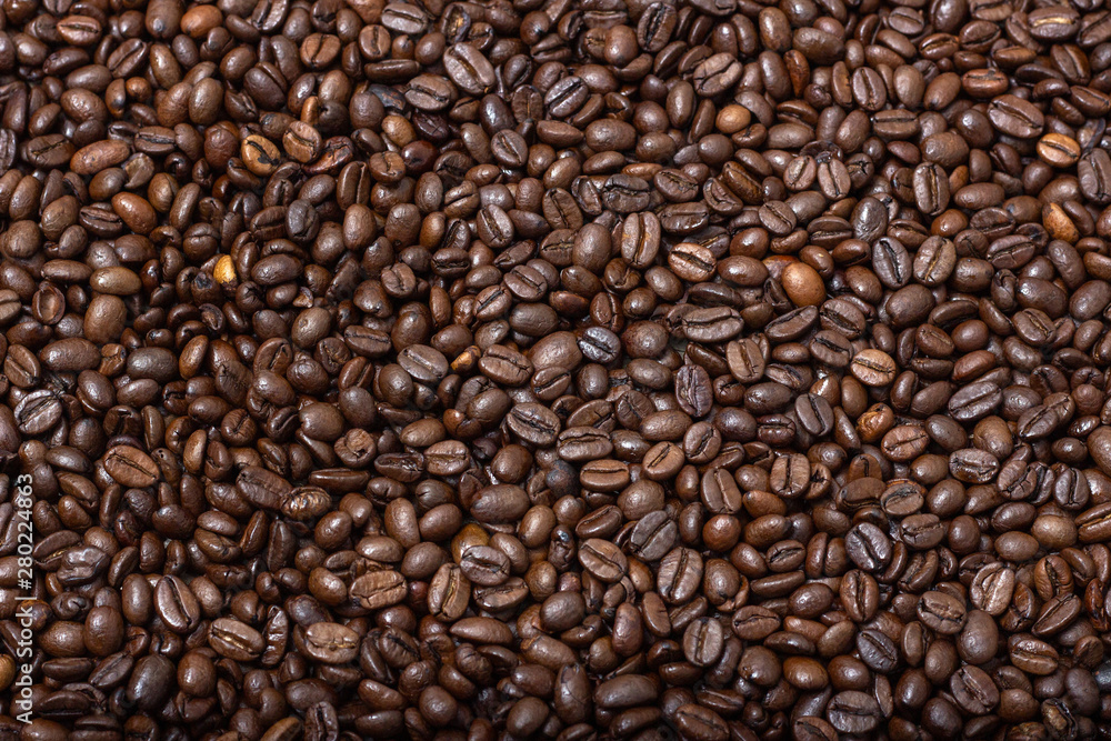 Background of roasted, fragrant coffee beans. Background of roasted, fragrant coffee beans.