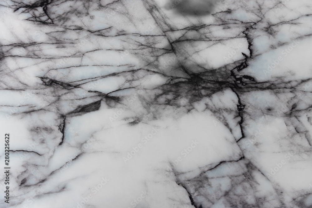 closeup of white marble texture background with black natural pattern.
