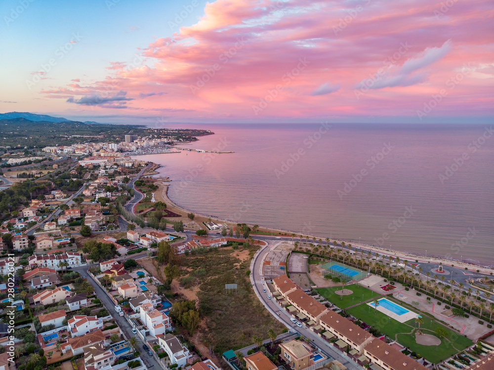 The incredible sunset over L'Ampolla, Catalonia, Spain. Drone aerial photo