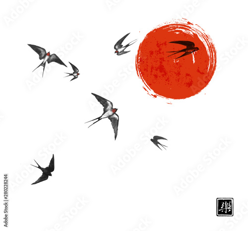 Flying swallow birds and big red sun on white background. Traditional Japanese ink wash painting sumi-e. Hieroglyph - joy