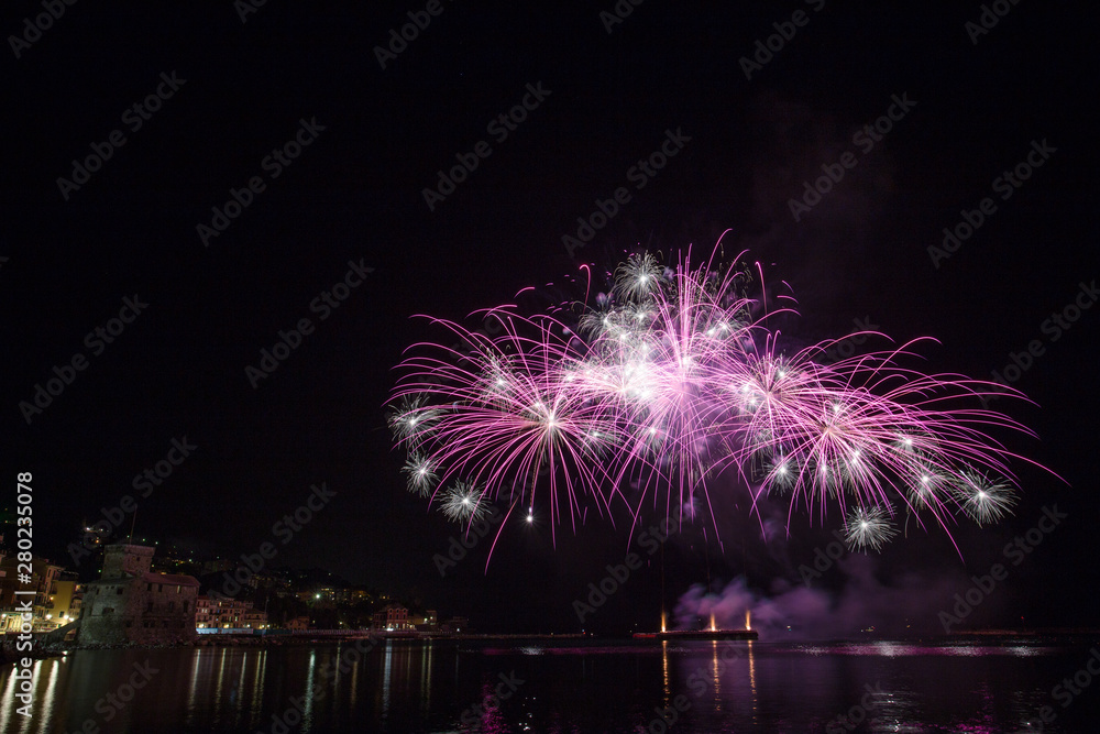 RAPALLO, ITALY JULY, 3, 2019 - Fireworks in Rapallo, Genoa province, Ligurian riviera, Italy. RAPALLO, ITALY JULY, 3, 2019 - Fireworks in Rapallo, Genoa province, Ligurian riviera, Italy.