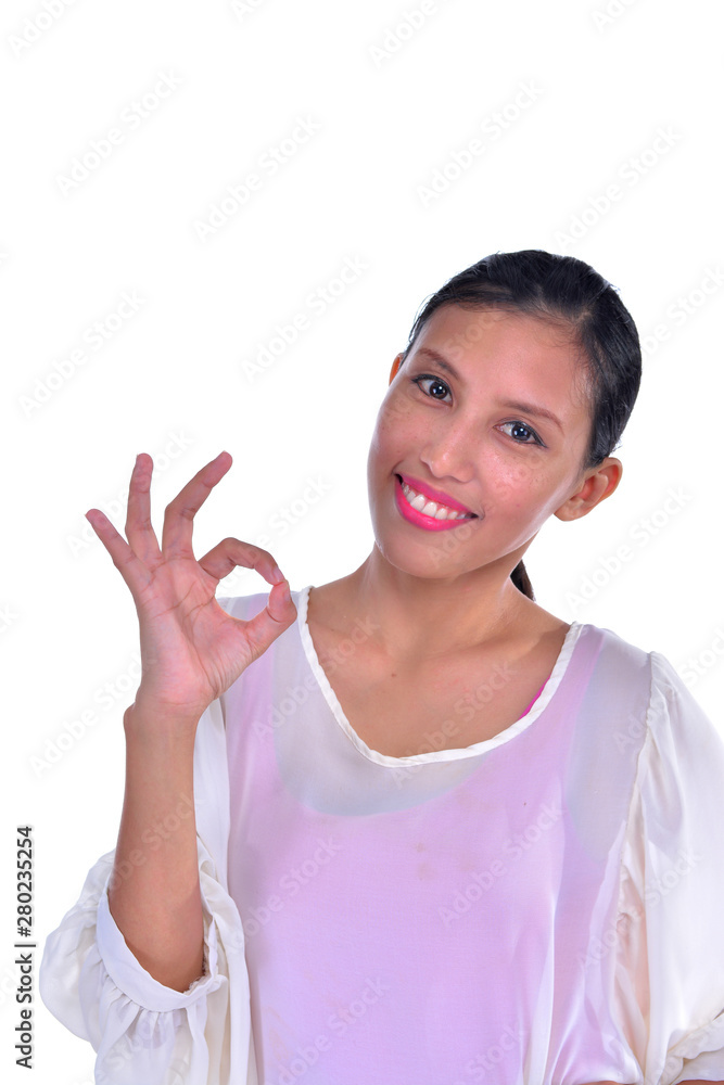 Young Asian business woman show OK sign isolated on white background Young Asian business woman show OK sign isolated on white background