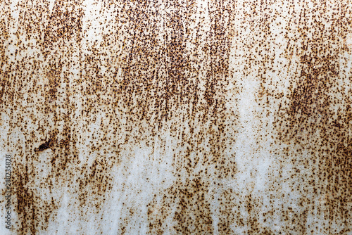 Dark worn rusty metal background. The texture of iron.