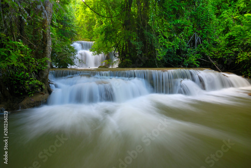 Beautiful waterfall in green forest shoot by slow shutter speed to make the water look softer, Huay Mae Kamin Waterfall in Thailand