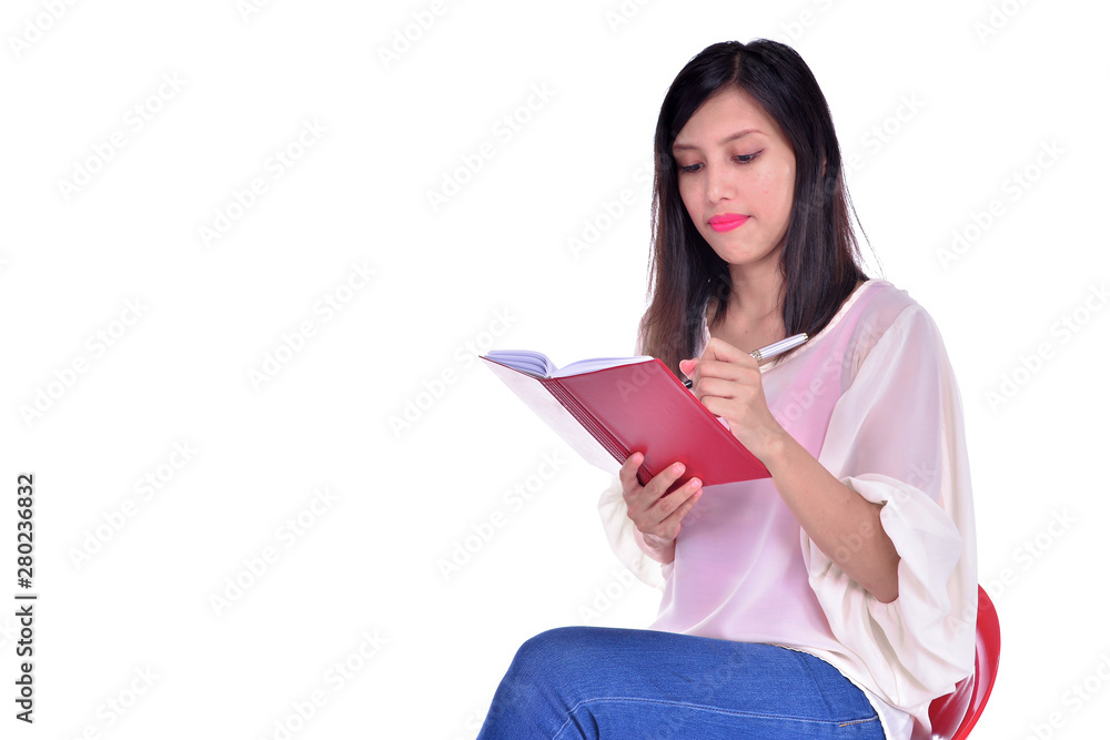 College girl with a pen and a textbook, isolated on white College girl with a pen and a textbook, isolated on white
