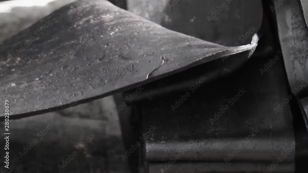 Use of rubber for industrial purposes. Machine for processing rubber