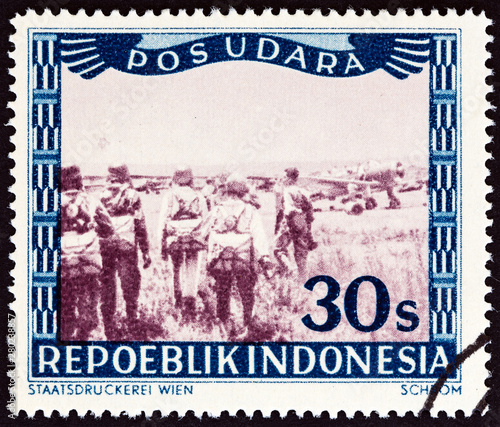 Airplanes and parachutists (Indonesia 1947)