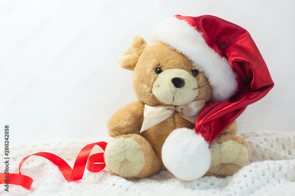 Christmas card with symbol of the year 2020 a rat in a red Santa hat on a white background. Christmas card with symbol of the year 2020 a rat in a red Santa hat on a white background.