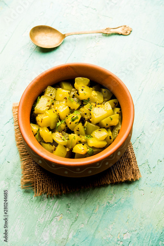 Lauki/doodhi ki sookhi Sabji also known as bottle gourd dry vegetable recipe. served in a bowl or karahi. selective focus photo