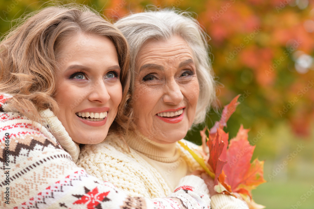 Portrait of senior woman with daughter resting Portrait of senior woman with daughter resting
