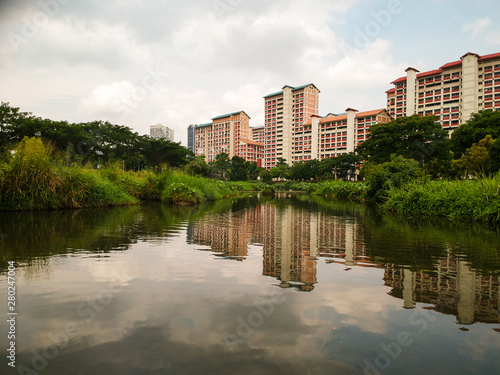 Residential area behind the park divided by a small river © Cons