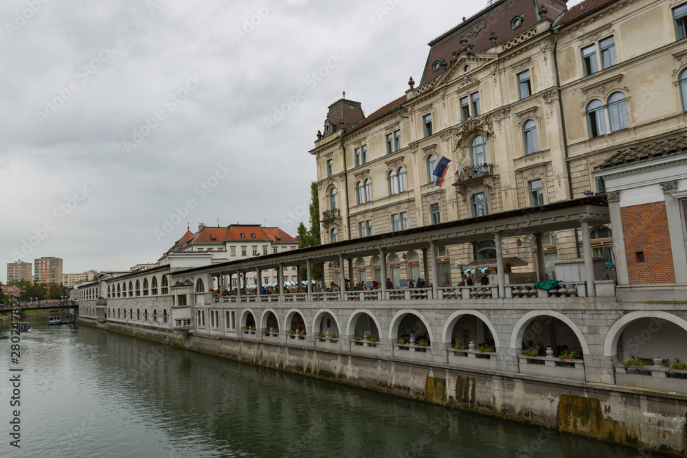 Ljubljana,Slovenia,6,2016: Street, river, bridges with dragons, magical city.
