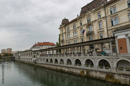 Ljubljana,Slovenia,6,2016: Street, river, bridges with dragons, magical city. © Teresa