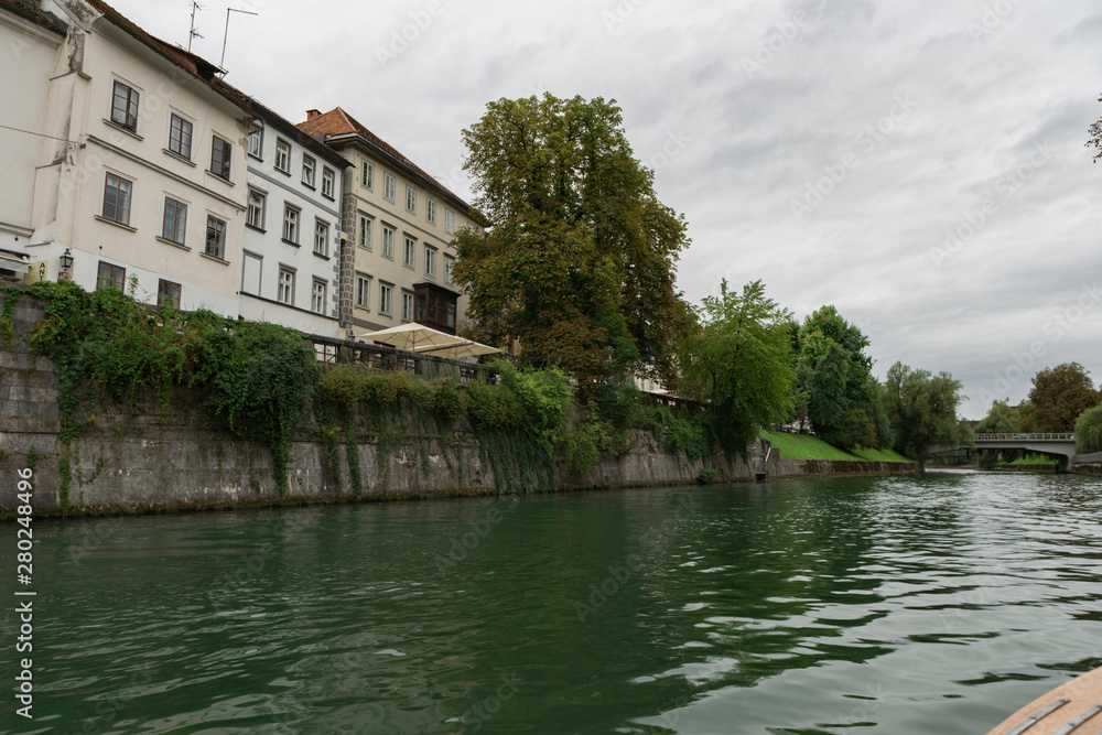 Ljubljana,Slovenia,6,2016: Street, river, bridges with dragons, magical city.