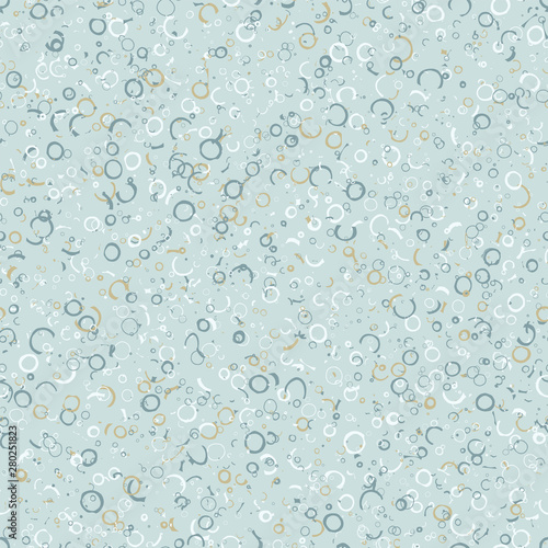 Seamless pattern with tiny speckled irregular recycled shapes. Natural rough handmade craft paper texture in aqua blue.  