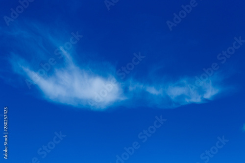 white cloud in blue sky shot on a summer day
