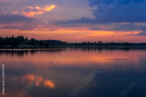 colorful sunset on the lake © tmag