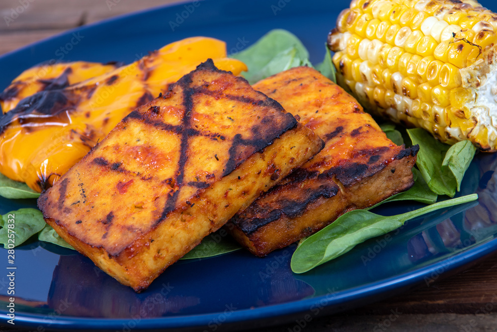 delicious grilled tofu slices with corn and yellow bell pepper delicious grilled tofu slices with corn and yellow bell pepper