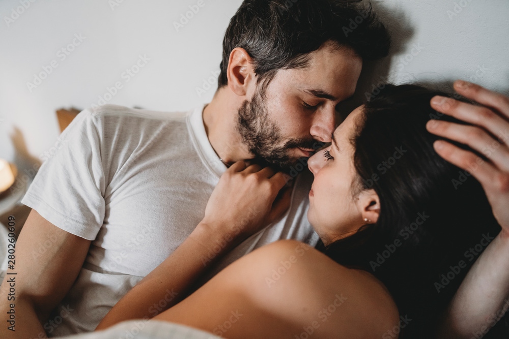 Young romantic couple in bed Young romantic couple in bed