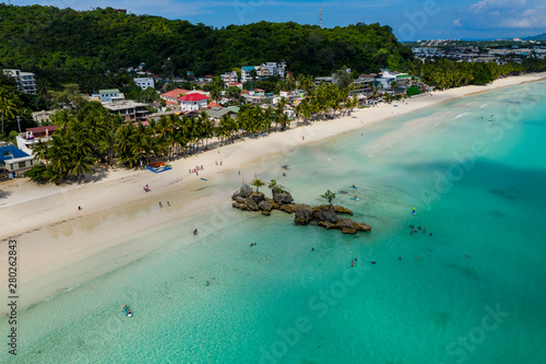 Aerial view of the famous White Beach and Willy's Rock on Boracay island in the Philippines