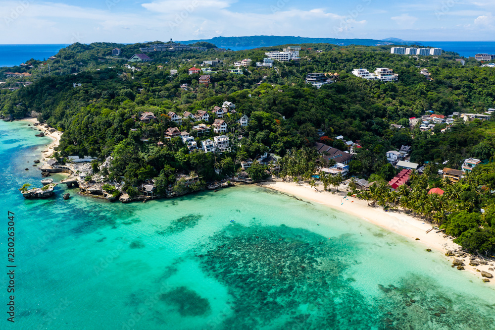 Aerial drone view of ruined and demolished buildings on Diniwid Beach, Boracay, Philippines