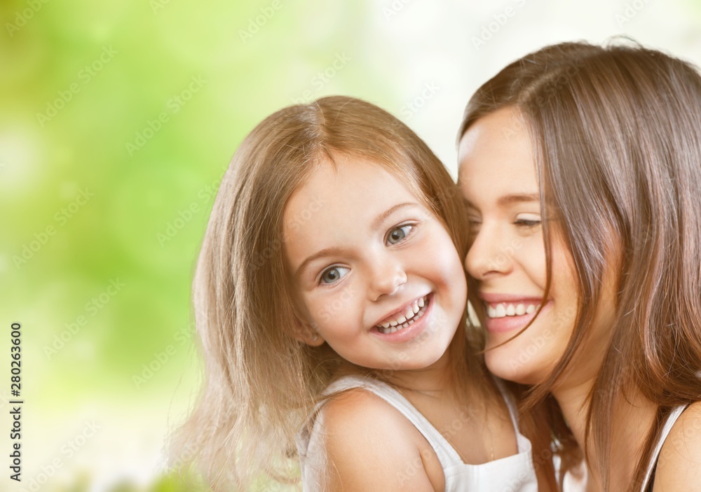 Happy Mother and daughter hugging Happy Mother and daughter hugging