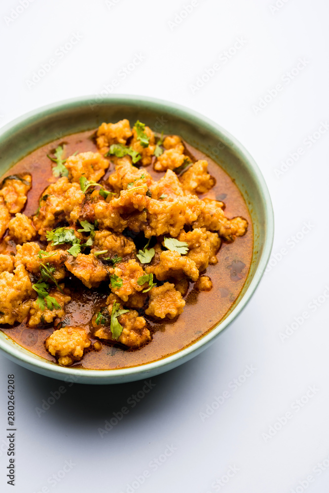 Home made mung dal masala vadi also known as Moong wadi or moongwadi or moongodi sabzi. It's a popular Maharashtrian recipe especially from Vidarbha region.