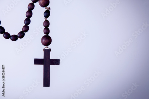 Close up rosary as symbol of salvation and eternal life. Religion tradition.