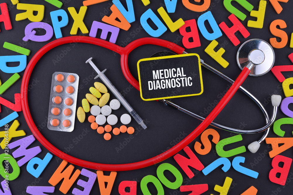 Pills, Syringe and Stethoscope with alphabet and text Medical Diagnostic