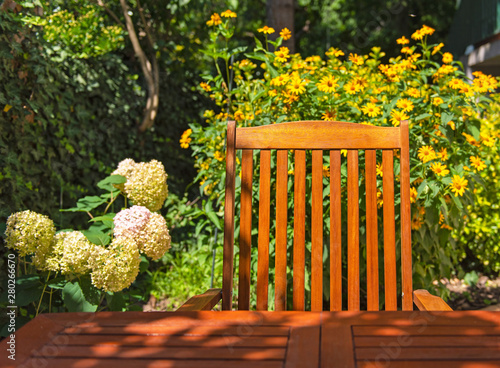 Wooden table with a sheet o...